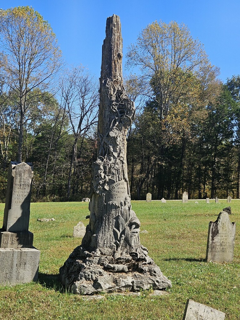 A detailed historic tree-shaped monument at Talbott Cemetery